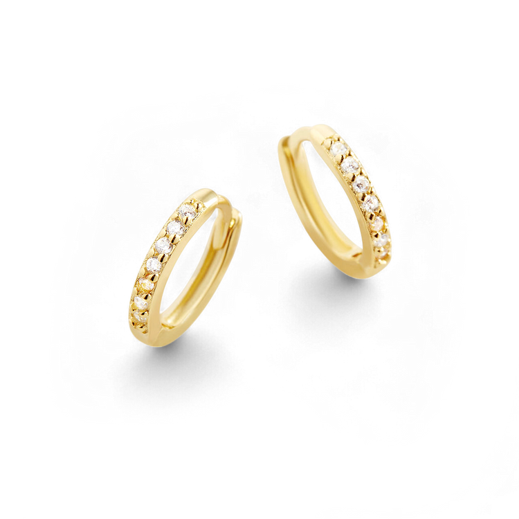 Pair of gold hoop earrings with embedded stones on a white background