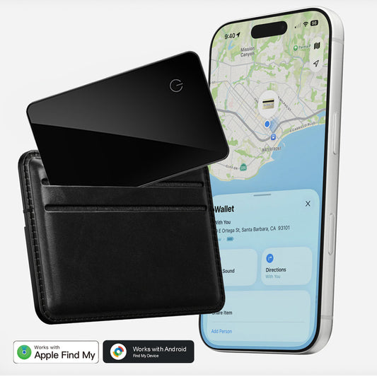 Black wallet with a card and smartphone displaying a map app on a white background