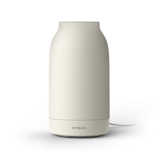 Beige humidifier with 'VITRUVI' branding on a white background