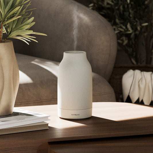 Beige humidifier with 'VITRUVI' branding on a white background