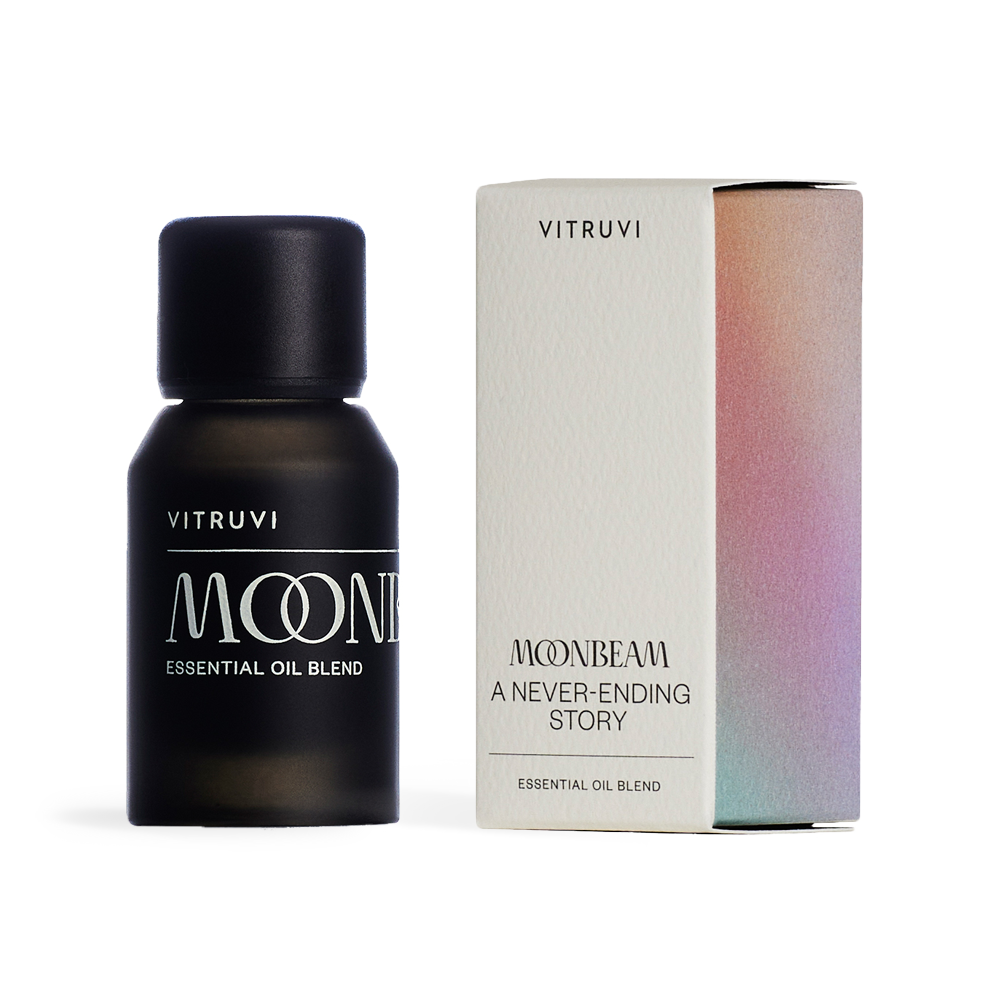Vitruvi Moonbeam essential oil blend bottle and packaging on a white background