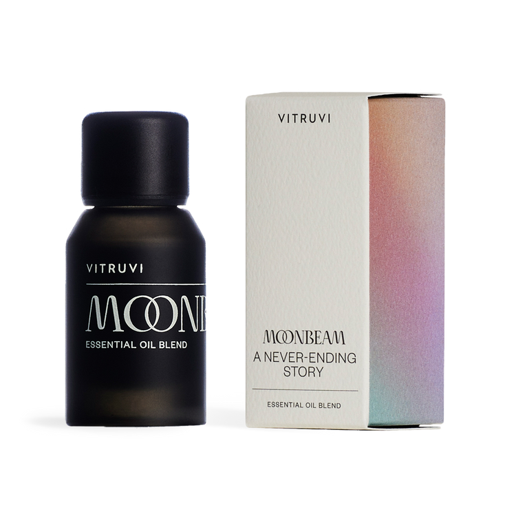 Vitruvi Moonbeam essential oil blend bottle and packaging on a white background