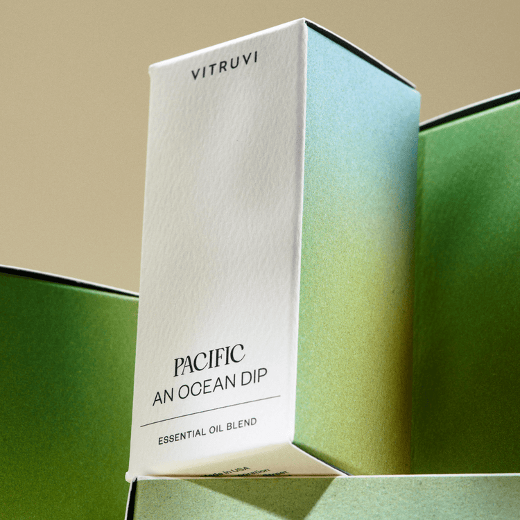 Vitruvi Pacific An Ocean Dip essential oil blend packaging on a green background
