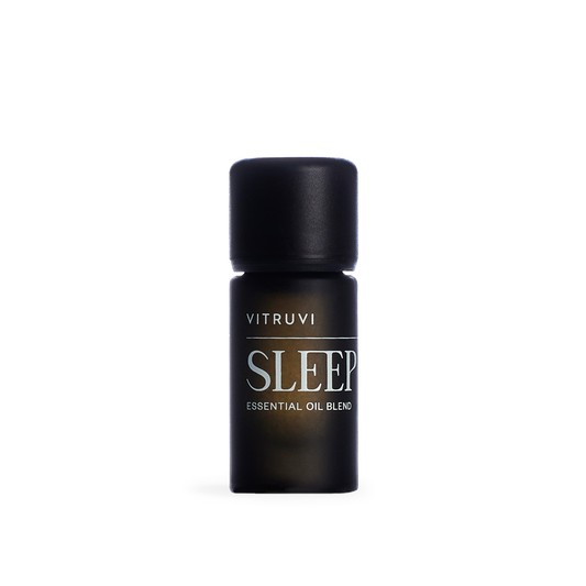 Vitruvi Sleep essential oil blend bottle on a transparent background