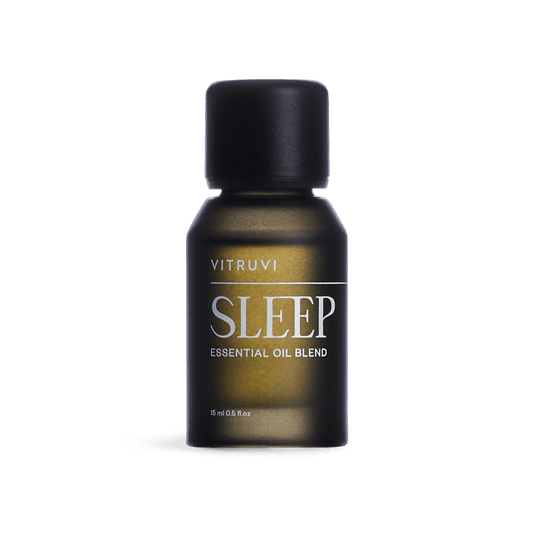 Vitruvi Sleep essential oil blend bottle on a transparent background