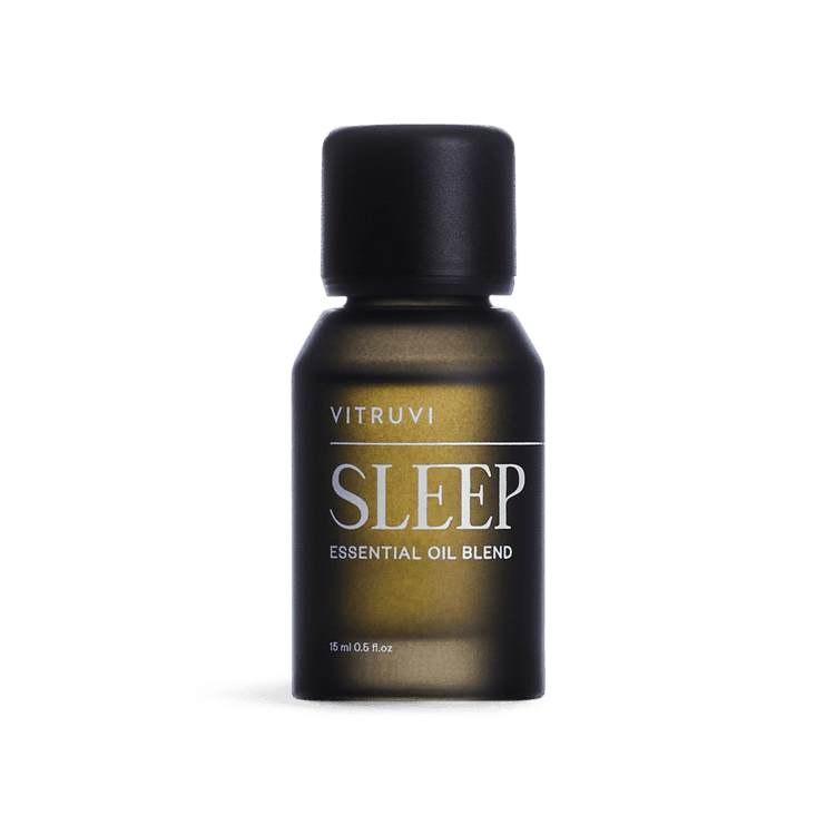 Vitruvi Sleep essential oil blend bottle on a transparent background