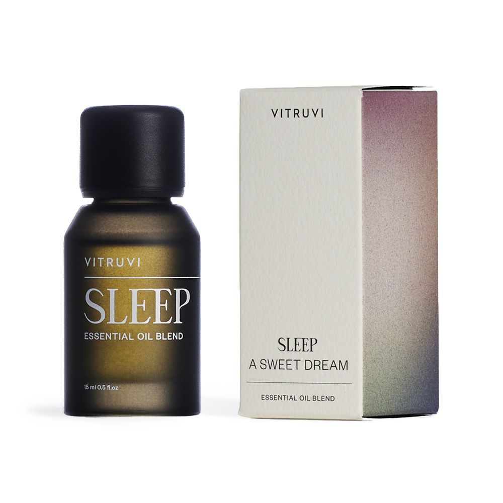 Vitruvi Sleep essential oil blend bottle and packaging on a white background