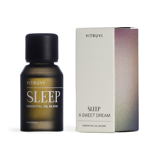 Vitruvi Sleep essential oil blend bottle on a transparent background