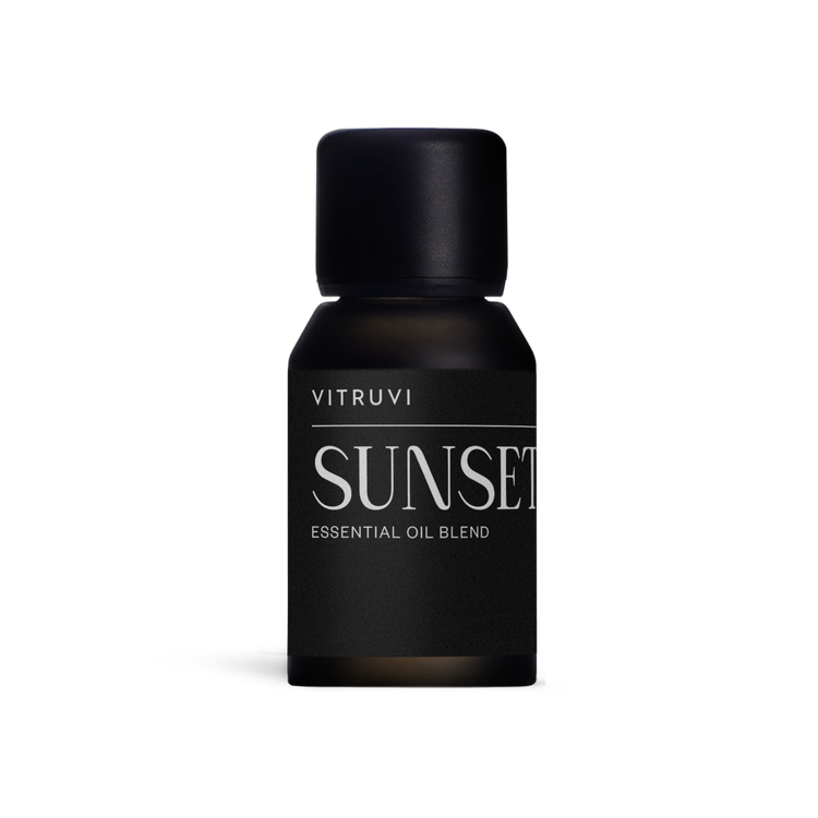 Vitruvi Sunset essential oil blend bottle on a white background