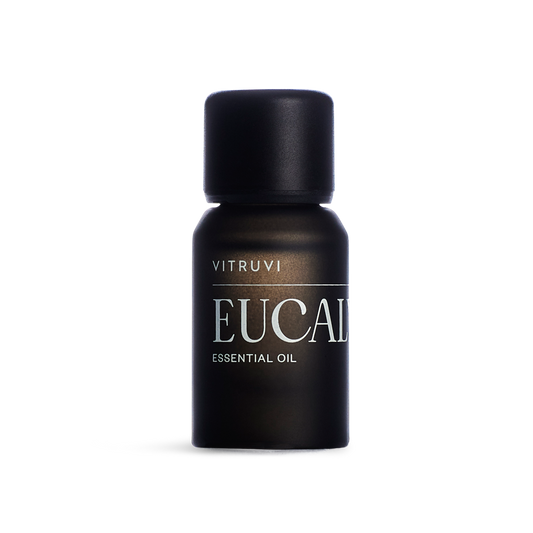 Vitruvi Eucalyptus essential oil bottle on a white background
