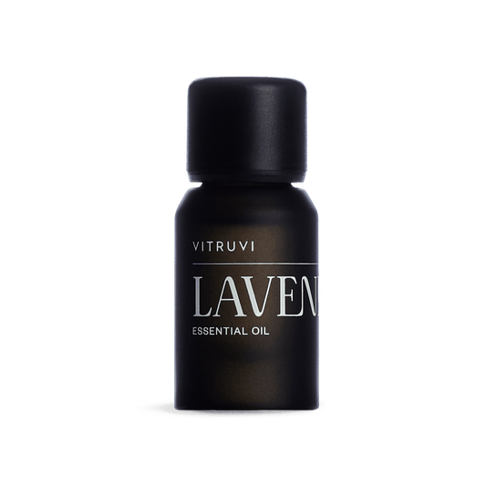 Vitruvi lavender essential oil bottle on a transparent background