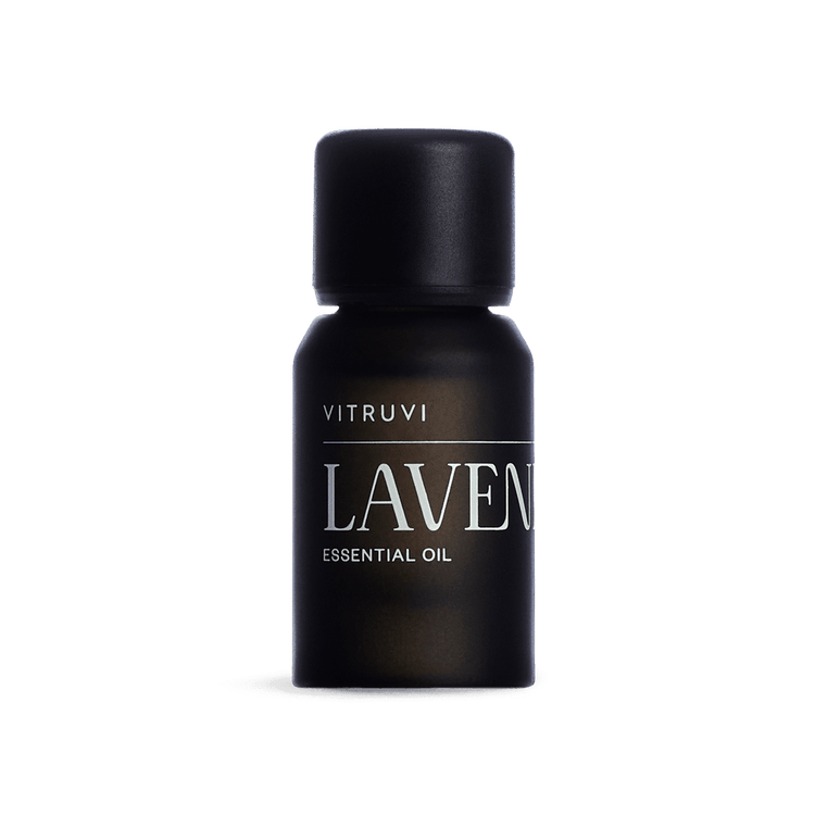 Vitruvi lavender essential oil bottle on a transparent background