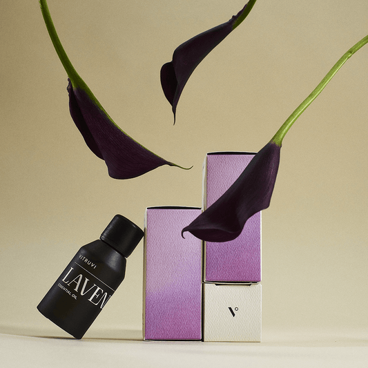 Vitruvi lavender essential oil bottle on a transparent background