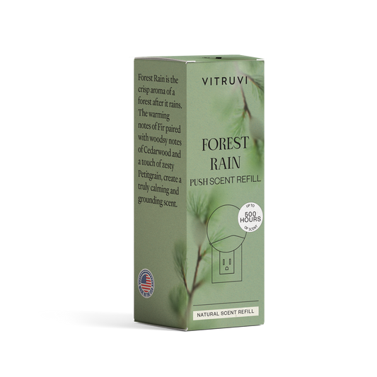 Vitruvi Forest Rain push-scent refill box on a white background