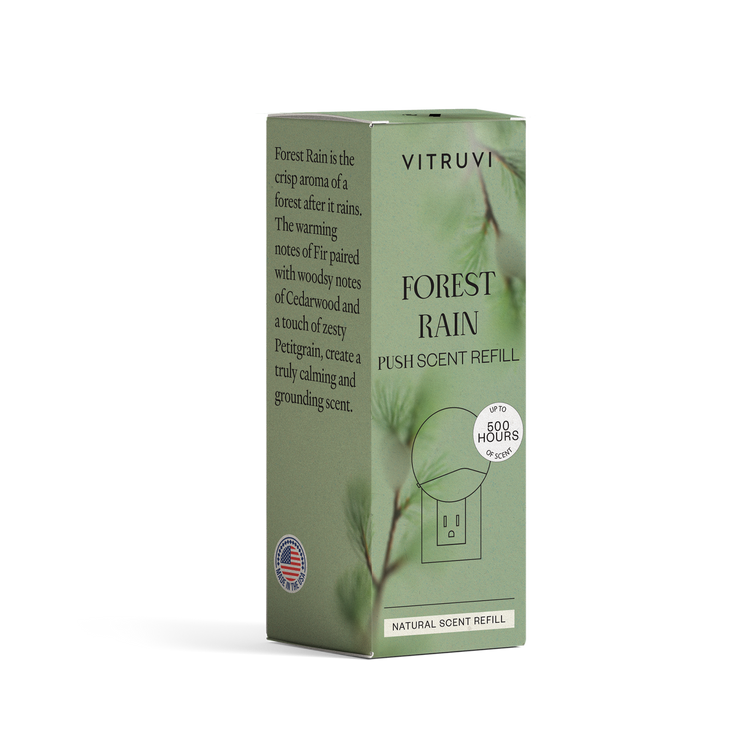 Vitruvi Forest Rain push-scent refill box on a white background