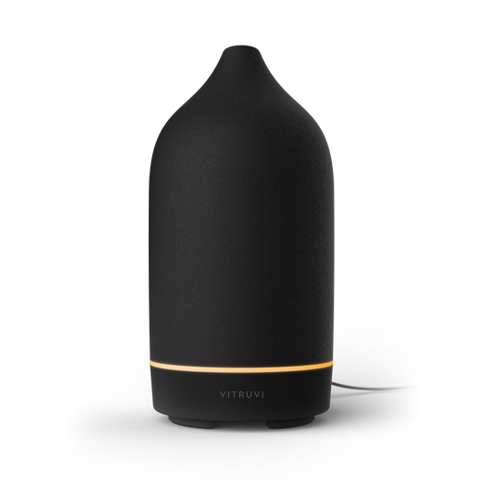 Black Vitruvi diffuser on a white background