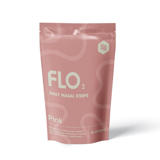 Green package of FLO2 daily nasal strips on a white background