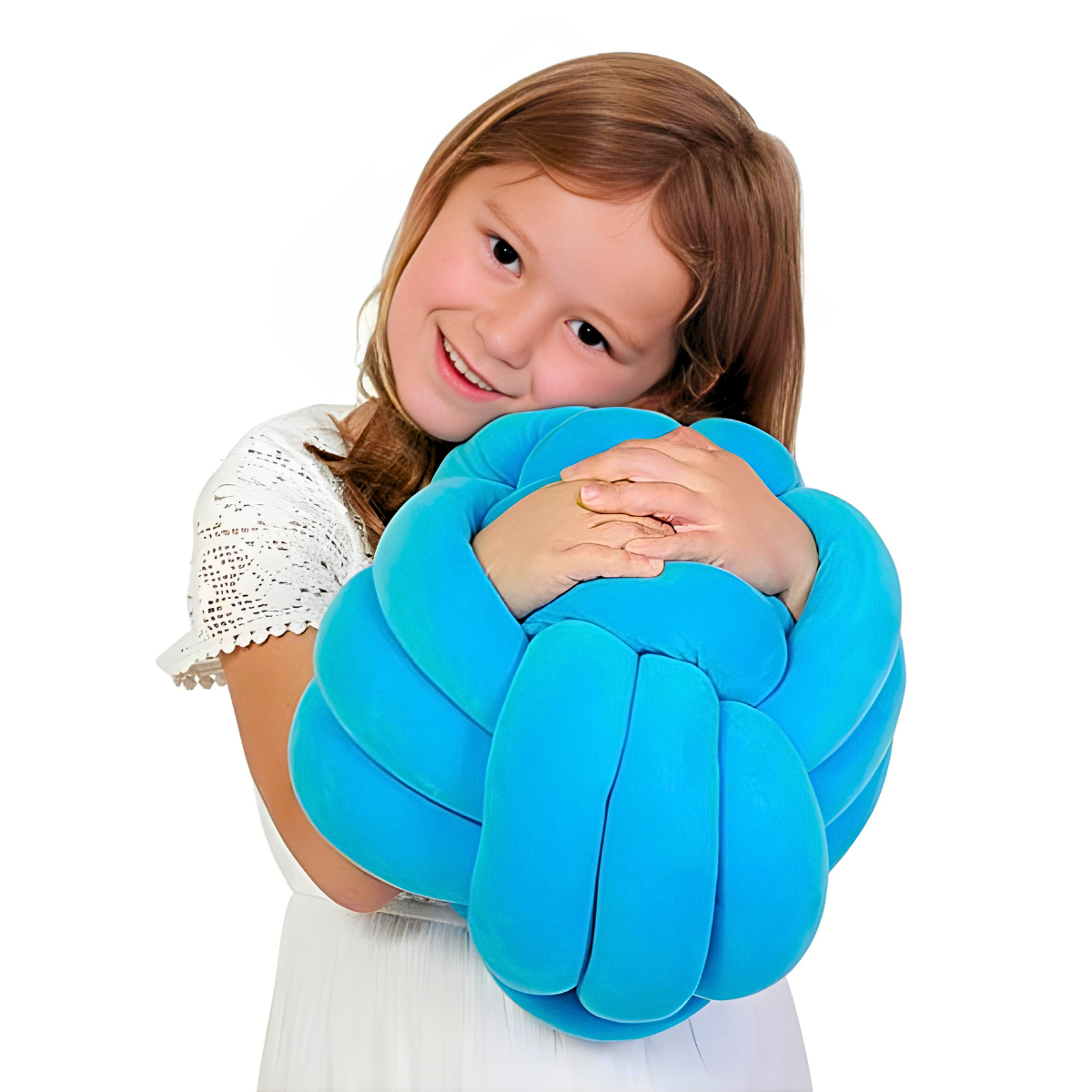 Child holding a blue inflatable pillow against a white background