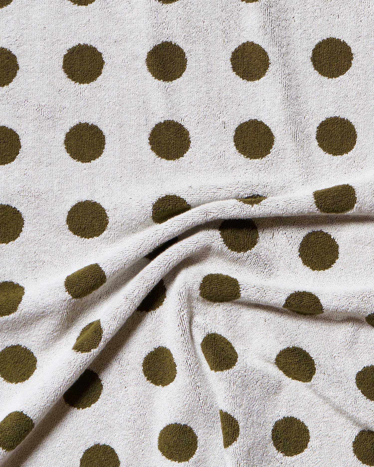 White fabric with brown polka dots