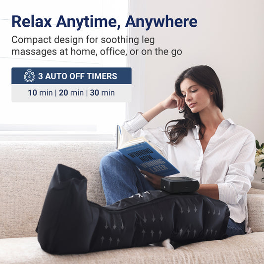 A woman sits on a beige sofa reading a book while wearing a black electric leg massager wrapped around her lower leg. The image includes promotional text highlighting the compact design, 3 auto off timers, and use at home, office, or on the go.