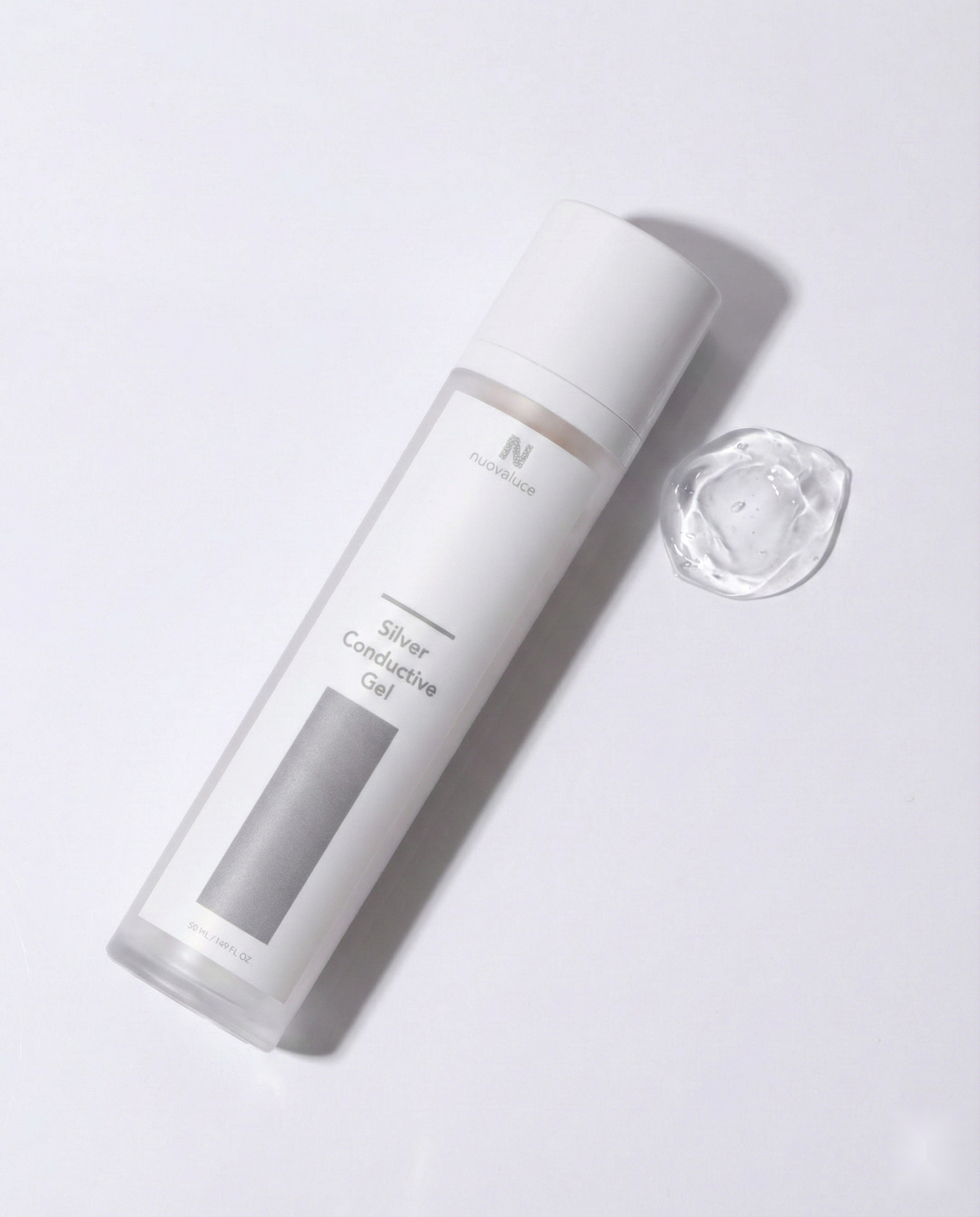 Silver conductive gel container with a small amount on a white background