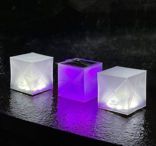 Solar Light with colors! Here the pink light is paired with the bright helix to make a glorious combination of light. Put them in your garden or around the pool, these are waterproof!