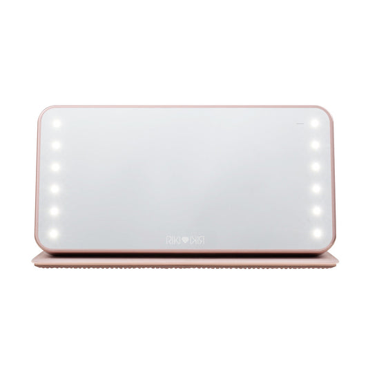 Cover of the rose gold Sparkle RIKI Powerful LED-lighted mirror and power bank by RIKI LOVES RIKI, adding sophistication to your beauty routine.