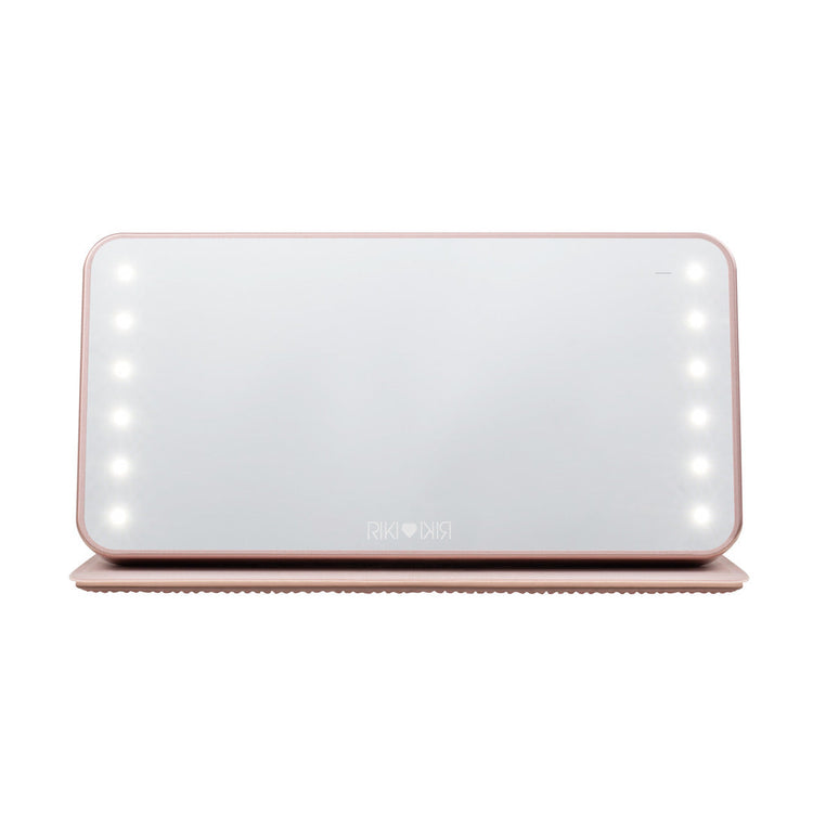 Front view of the Sparkle RIKI Powerful LED-lighted mirror and power bank in  rose gold by RIKI LOVES RIKI, perfect for flawless makeup application with a light up travel mirror.