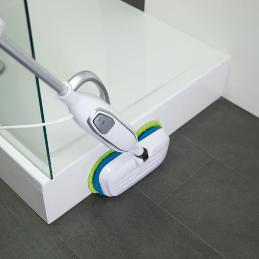 White and green floor cleaning device on a white background
