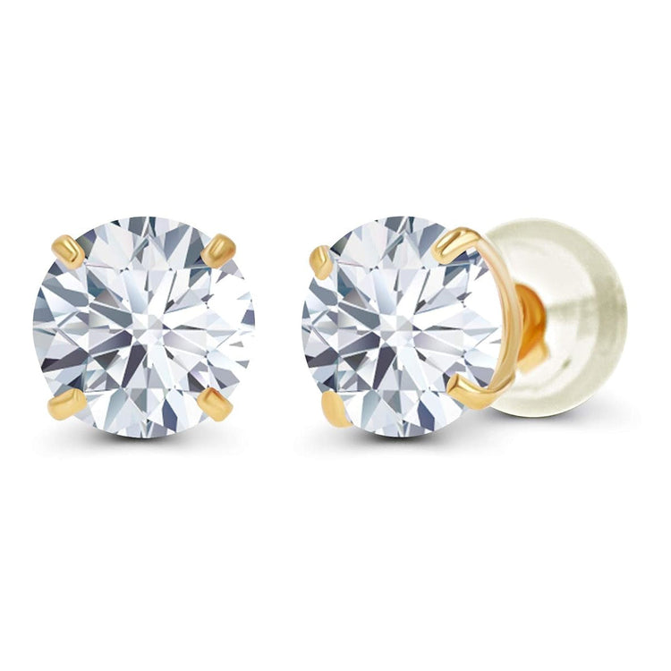 Gold earrings with clear gemstones on a white background