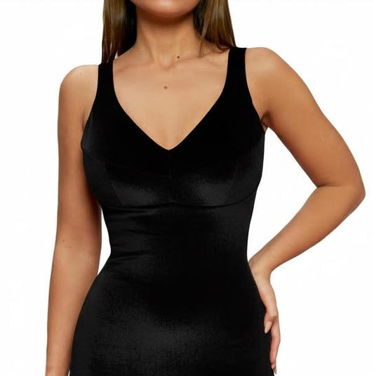 Black sleeveless dress worn by a model on a white background