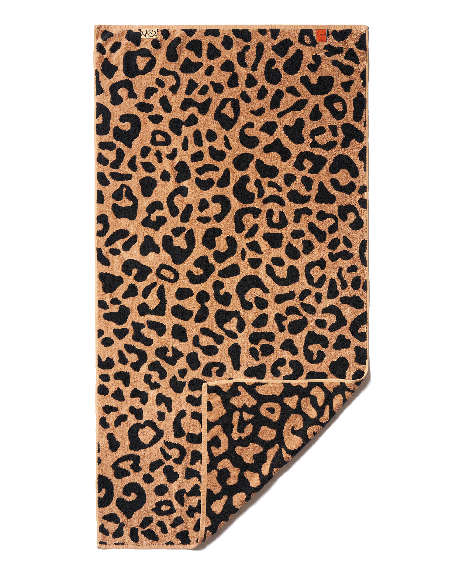 Leopard print towel on a black background