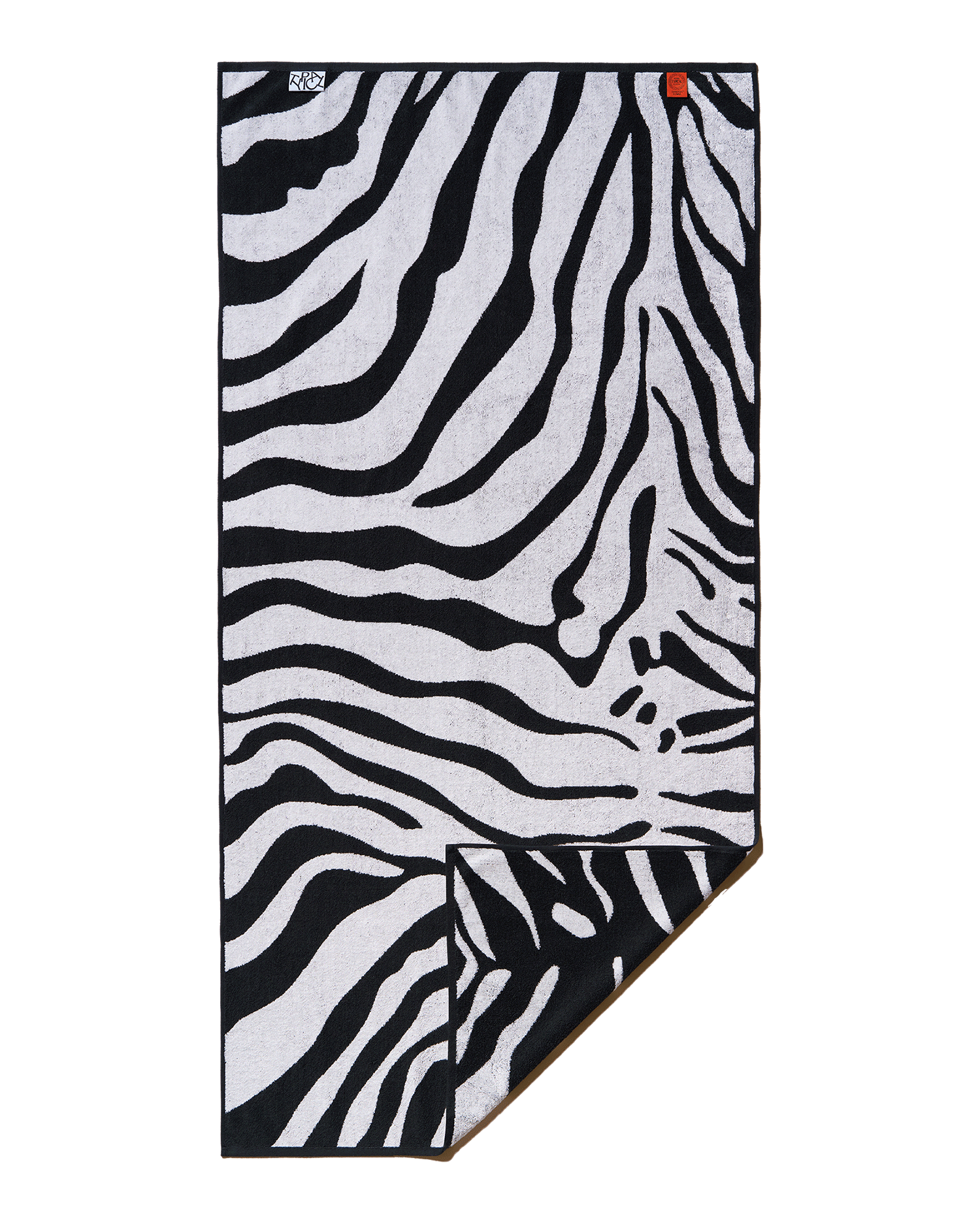 Zebra patterned towel on a black background